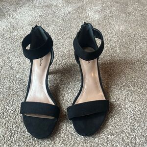 Black microsuede 3 1/2” heels with a zippered back